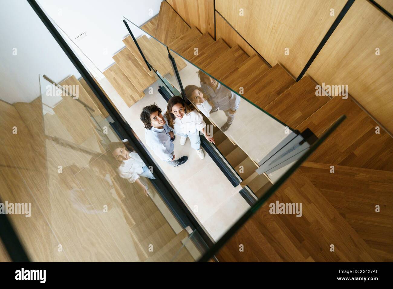 Smiling mid adult couple at new home Stock Photo