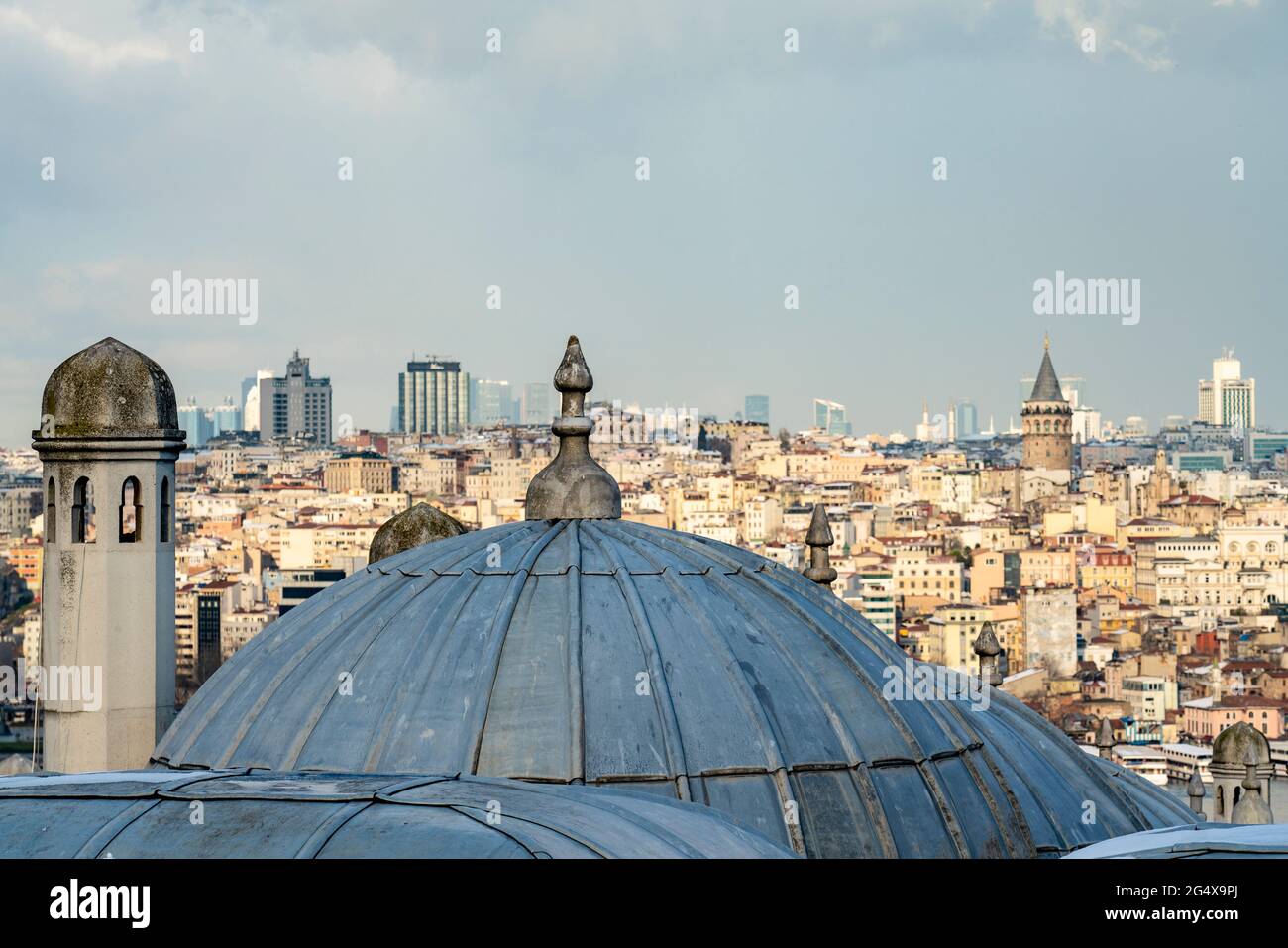 Turkey, Istanbul, Dome of Suleymaniye Mosque with city buildings in background Stock Photo