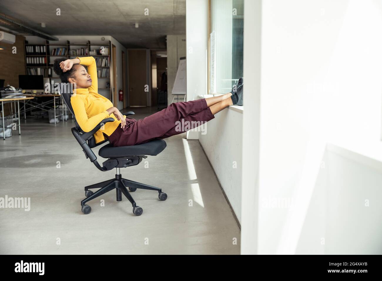 Business woman relaxing feet on hi-res stock photography and images - Alamy