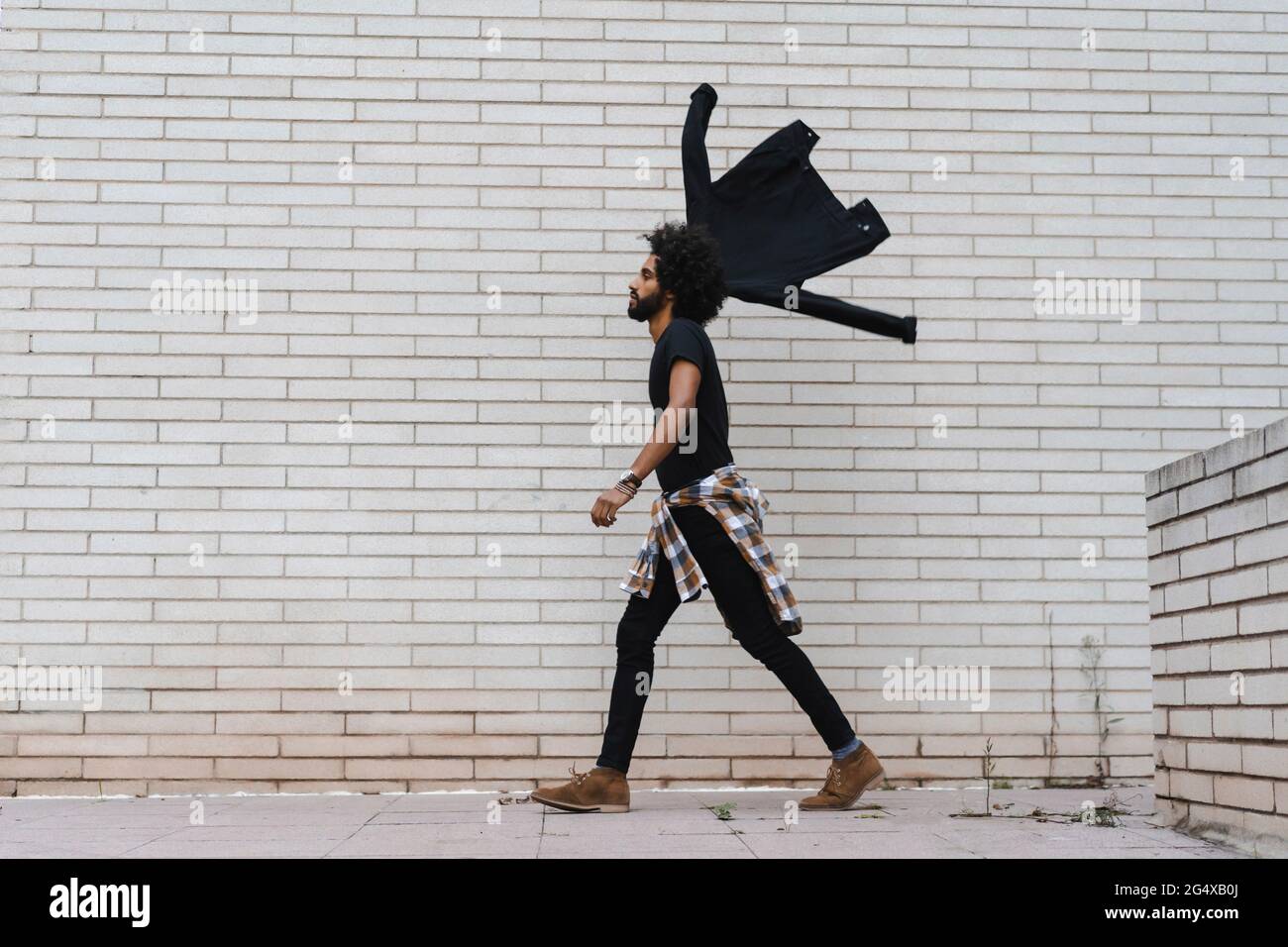 Man walking side view jacket hi-res stock photography and images - Alamy