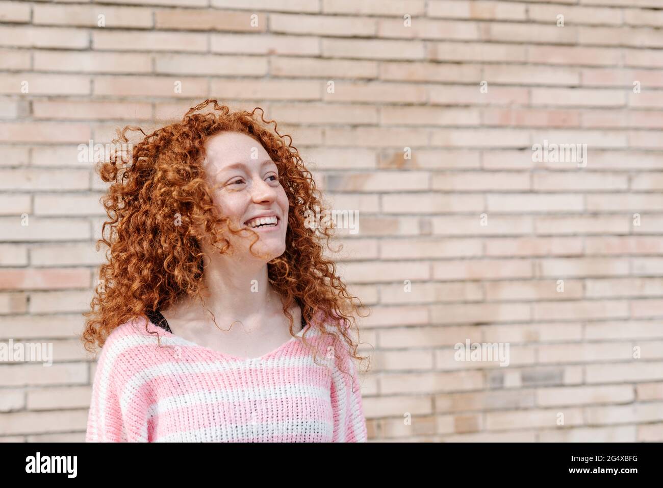 Young cheerful redhead woman hi-res stock photography and images - Alamy