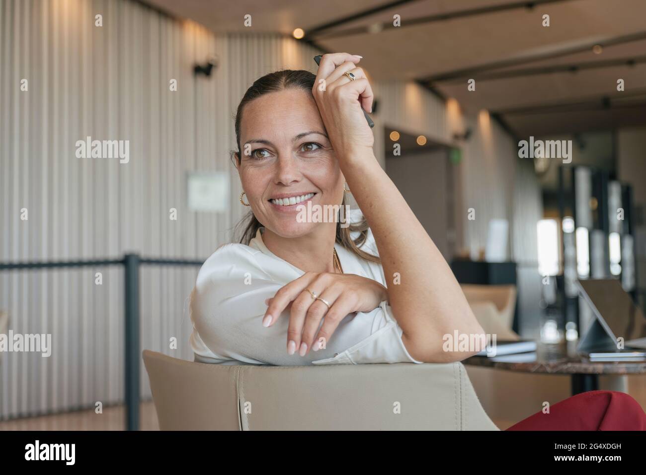 Female sitting in chair hi-res stock photography and images - Alamy