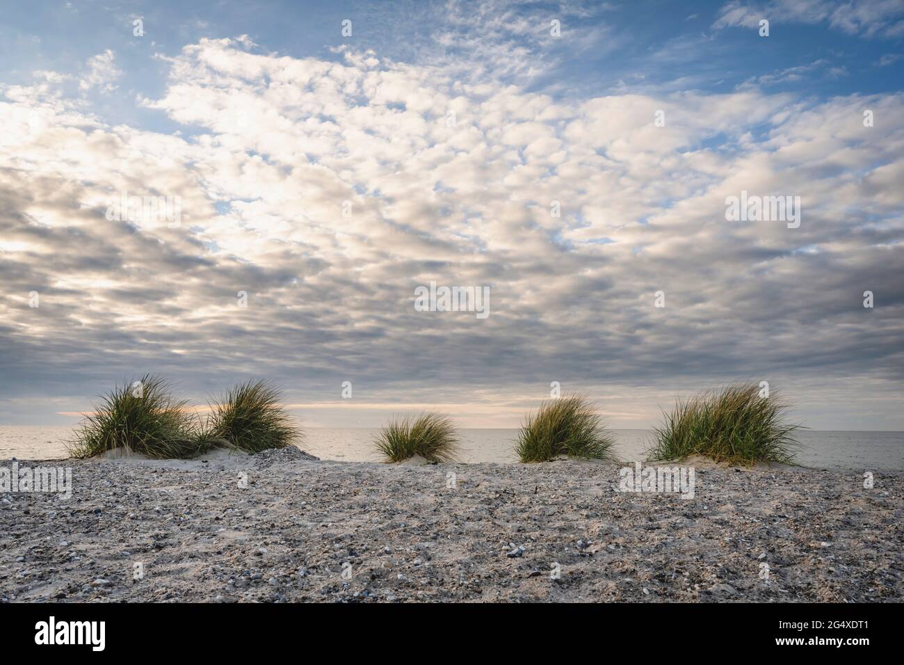 Cloudy sunset over beach at Fehmarn island Stock Photo