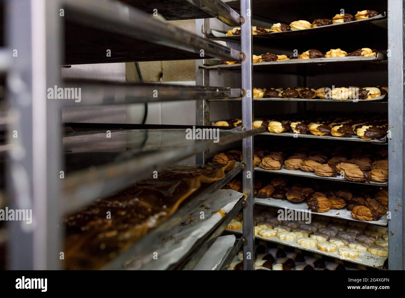 Storage compartment with pastry items in bakery Stock Photo