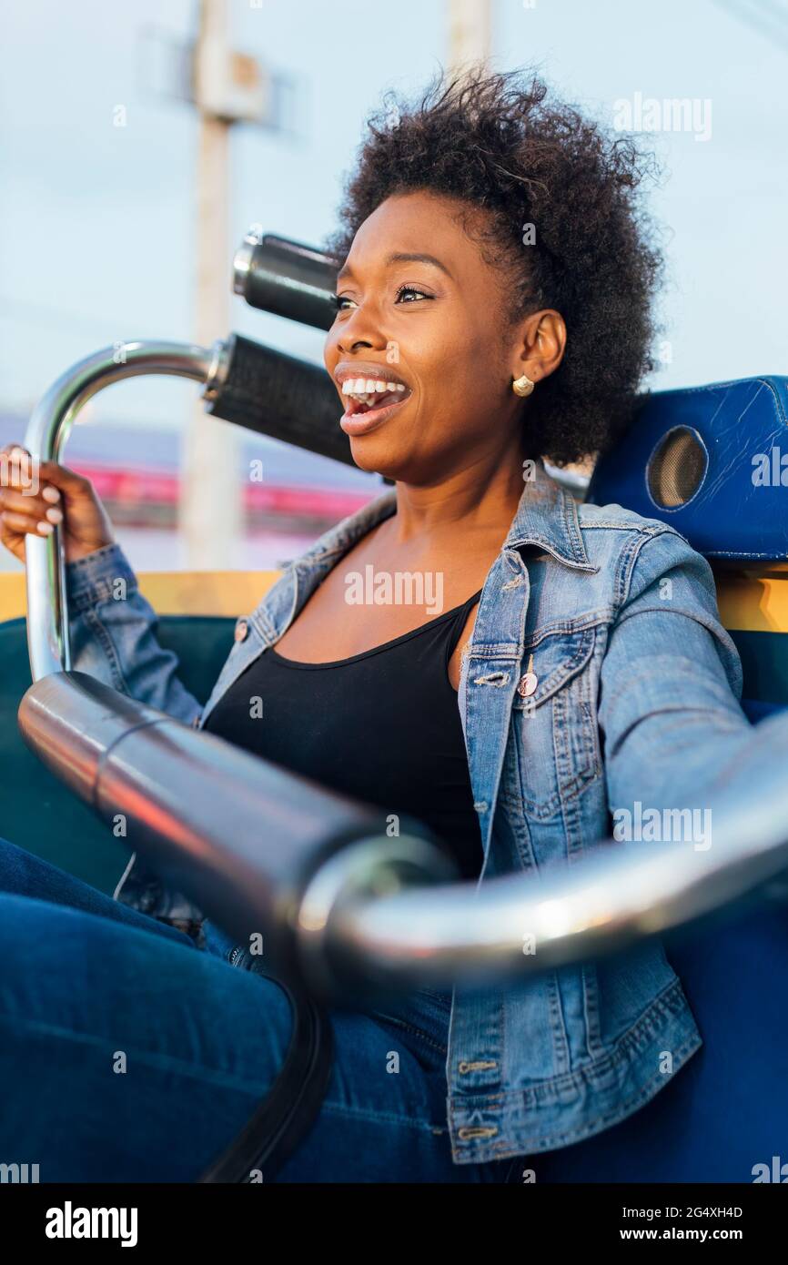 African woman sitting hi-res stock photography and images - Alamy