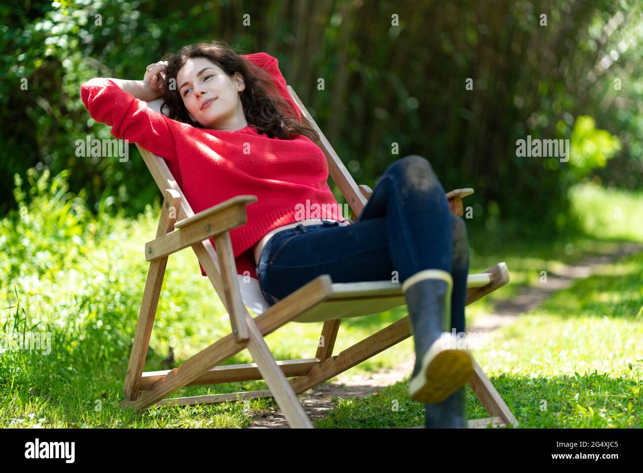 Woman relaxing in sunshine hi-res stock photography and images - Alamy