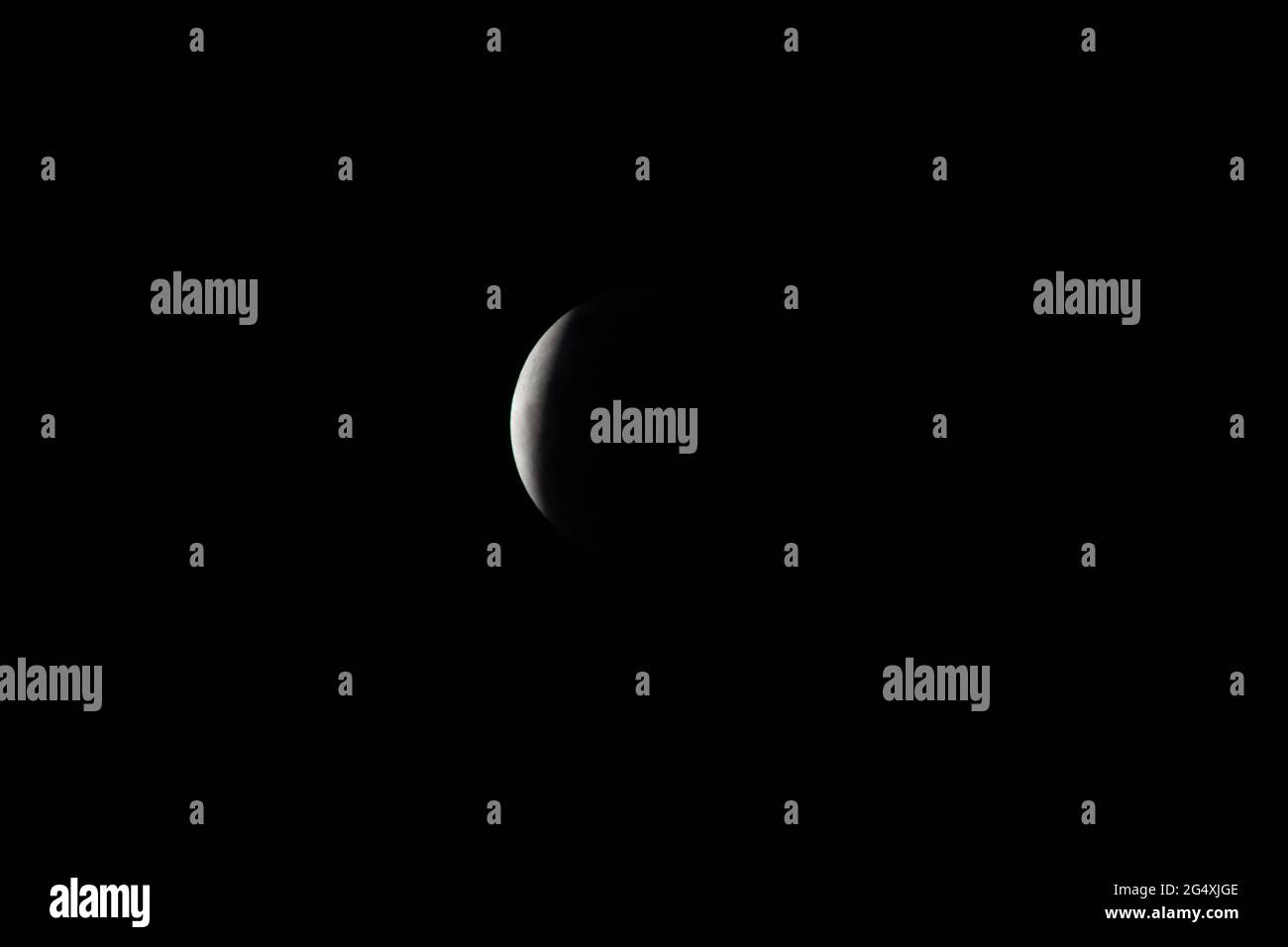 during total lunar eclipse with earth shadow showing, taken from