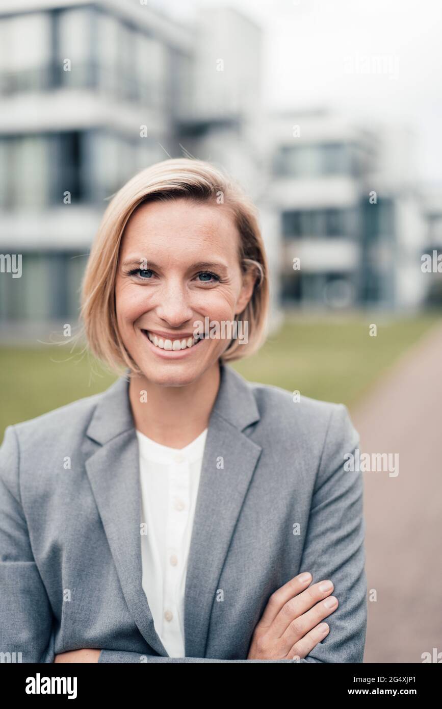 Crossed smiling hi-res stock photography and images - Alamy