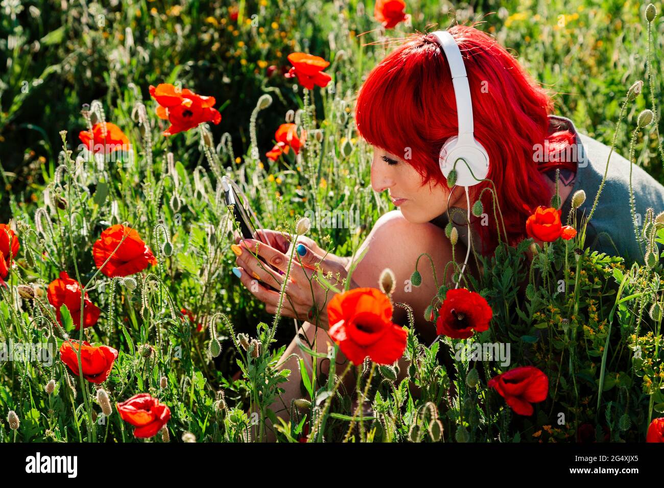 Smart red haired woman hi-res stock photography and images - Alamy