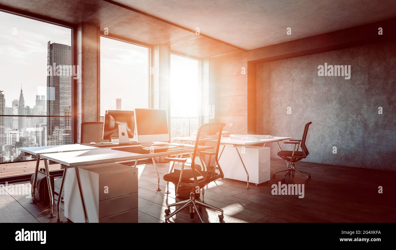 Interior of office with sunlight streaming through window Stock Photo