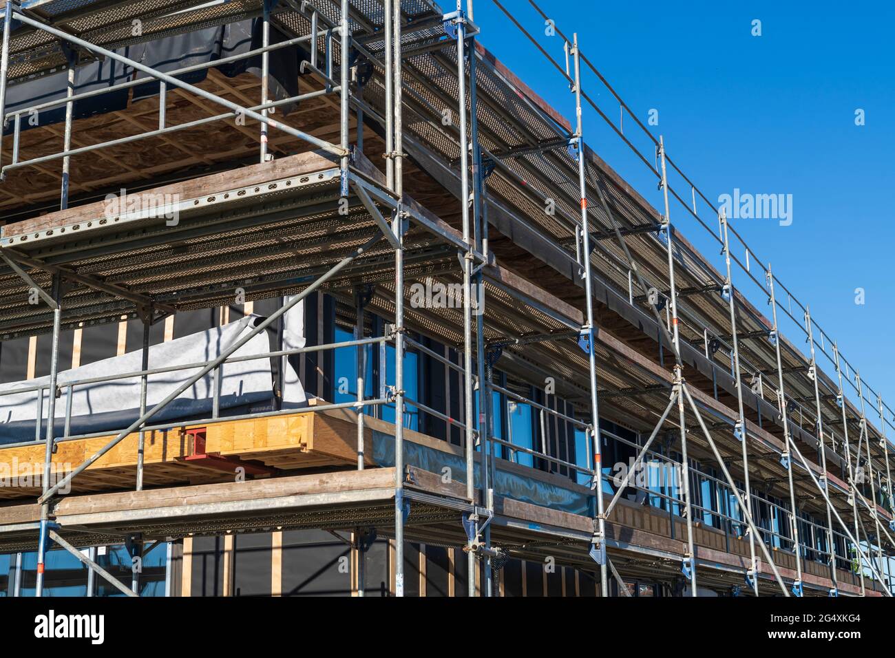 A scaffold on a new building Stock Photo