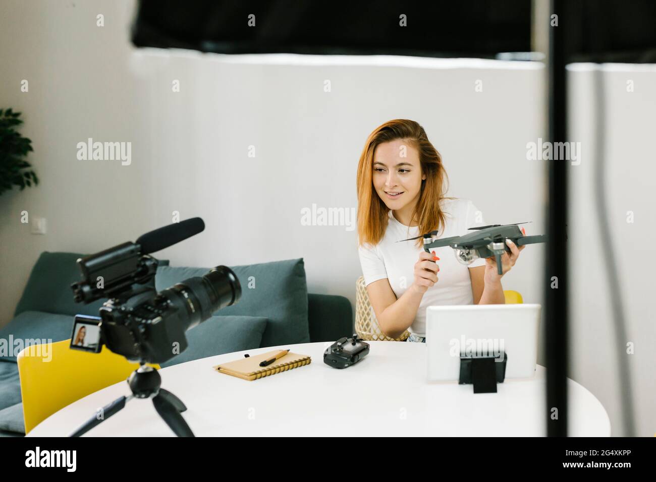 Female influencer vlogging at home Stock Photo