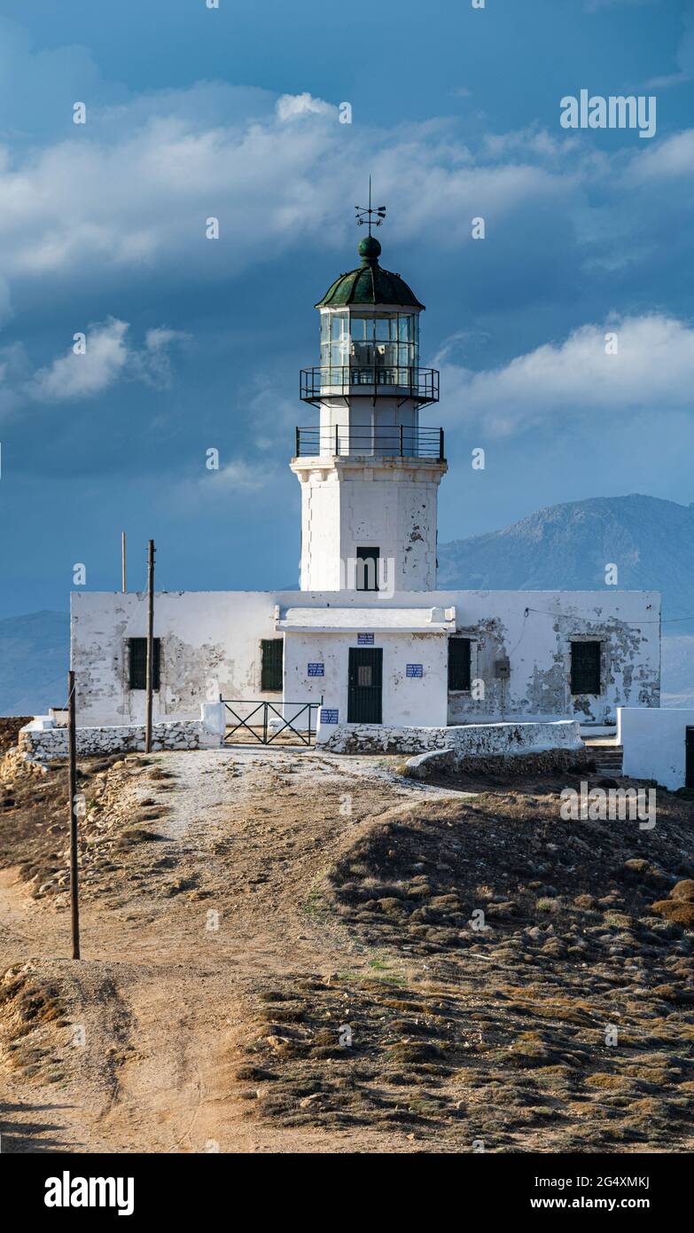 Armenistis Lighthouse By Cloudy Sky In Mykonos Hi res Stock Photography armenistis-lighthouse-by-cloudy-sky-in-mykonos-hi-res-stock-photography