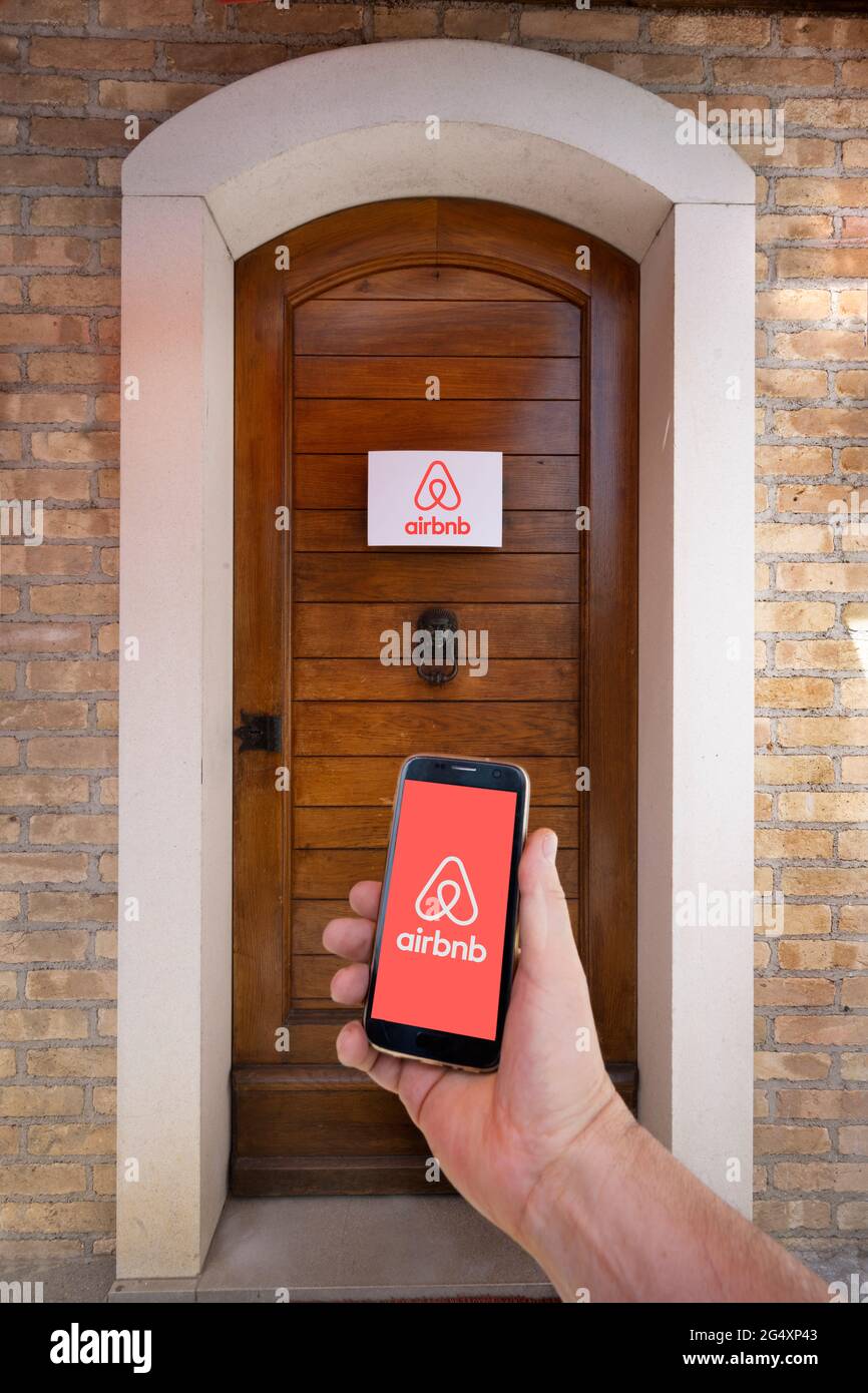 In Front Of The Door Of A House Rented Through The Airbnb Platform ...