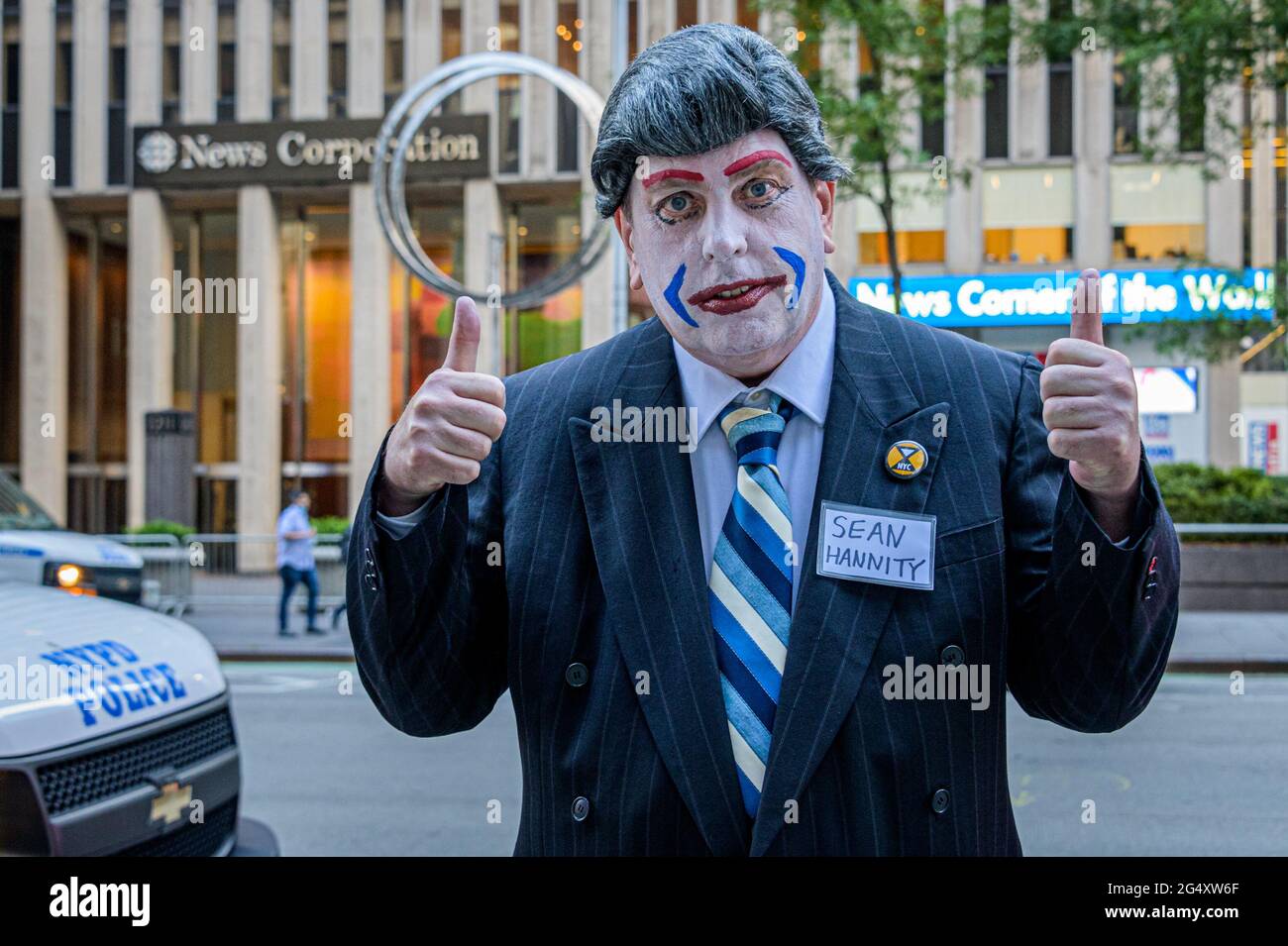 USA. 23rd June, 2021. A group of activists dressed as clowns held a street protest on June 23, 2021 outside Fox News Headquarters in Manhattan. In their opinion, Fox News has been treating our democracy like a circus, so they decided to bring the circus to their doorstep. (Photo by Erik McGregor/Sipa USA) Credit: Sipa USA/Alamy Live News Stock Photo