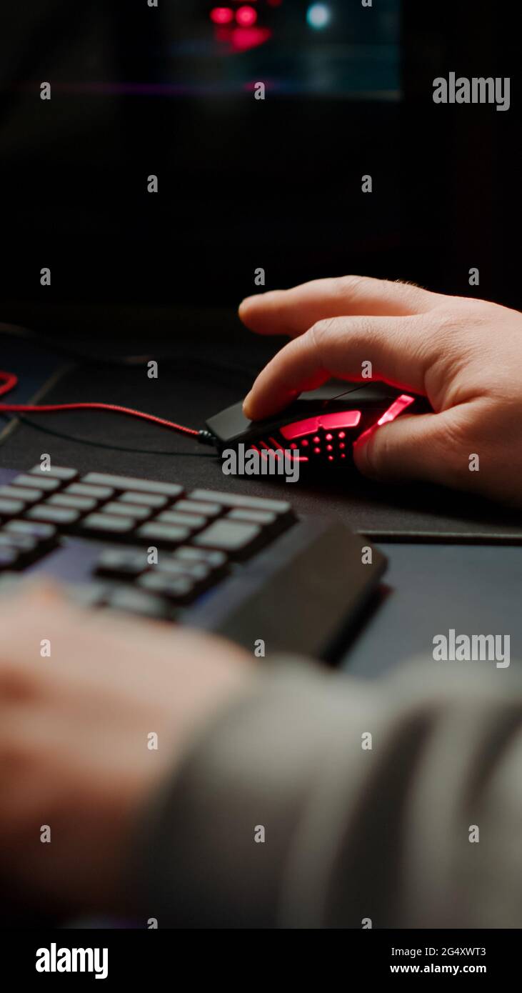 Hands typing on rgb keyboard hi-res stock photography and images - Alamy