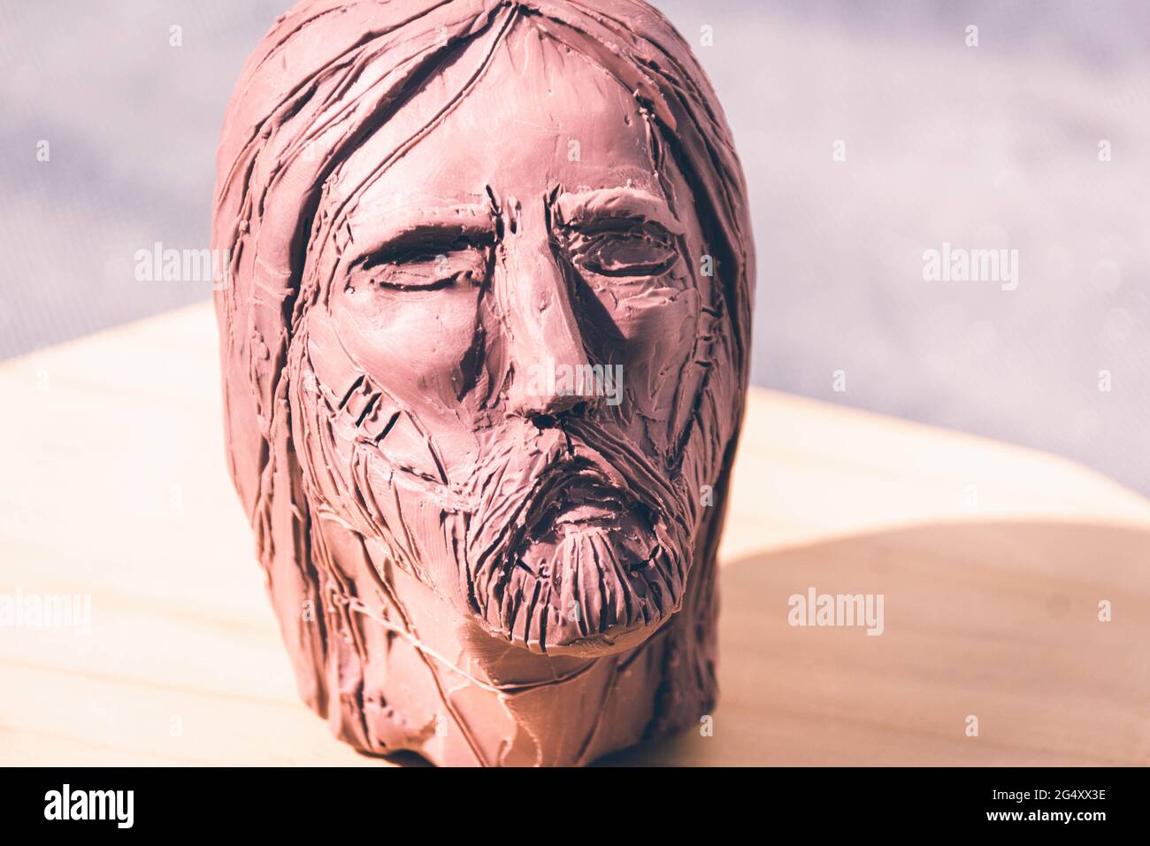 Photograph of Jesus Christ face clay sculpture Stock Photo