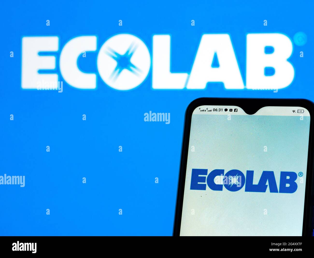 In this photo illustration, an Ecolab Inc. logo seen displayed on a