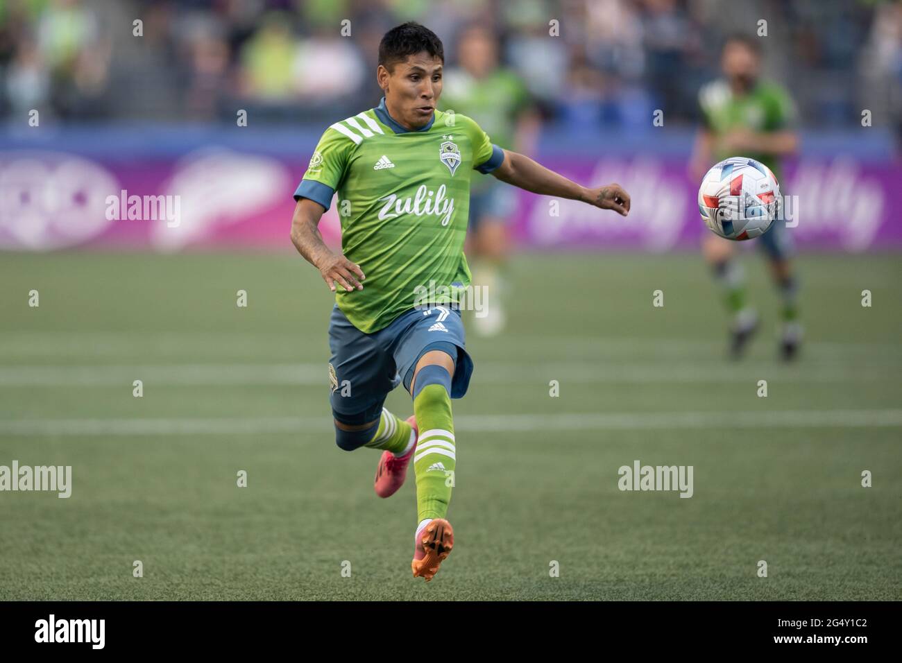 Seattle Sounders forward Raul Ruidiaz (9) runs with the ball during the first half of an MLS match against the Real Salt Lake at Lumen Field, Wednesda Stock Photo