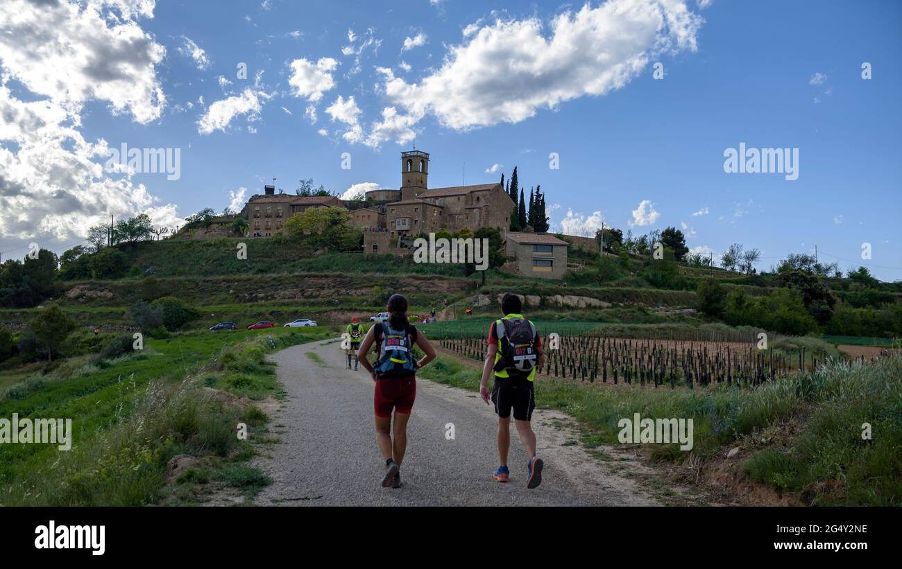 Runners doing the Romànica race, a long-distance GR trail that passes through more than 20 Romanesque hermitages in central Catalonia, Barcelona Spain Stock Photo