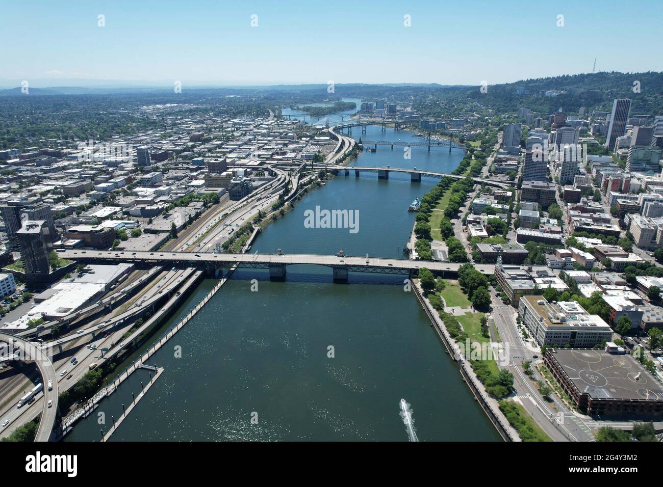 An aerial view the Williamette River and the downtown Portland, Ore skyline as a backdrop, Wednesday, June 23, 2021. Stock Photo