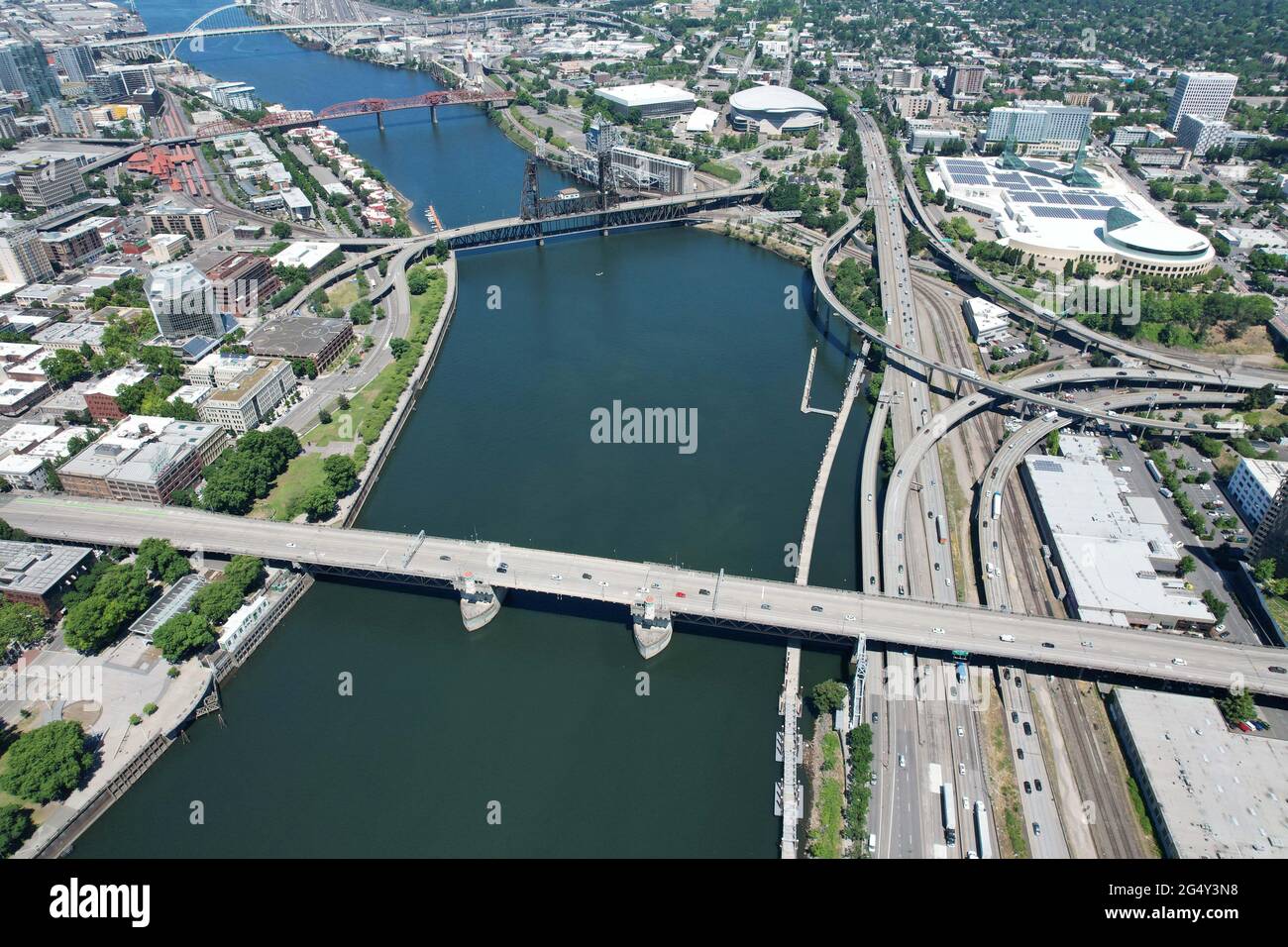An aerial view the Williamette River and the downtown Portland, Ore skyline as a backdrop, Wednesday, June 23, 2021. Stock Photo