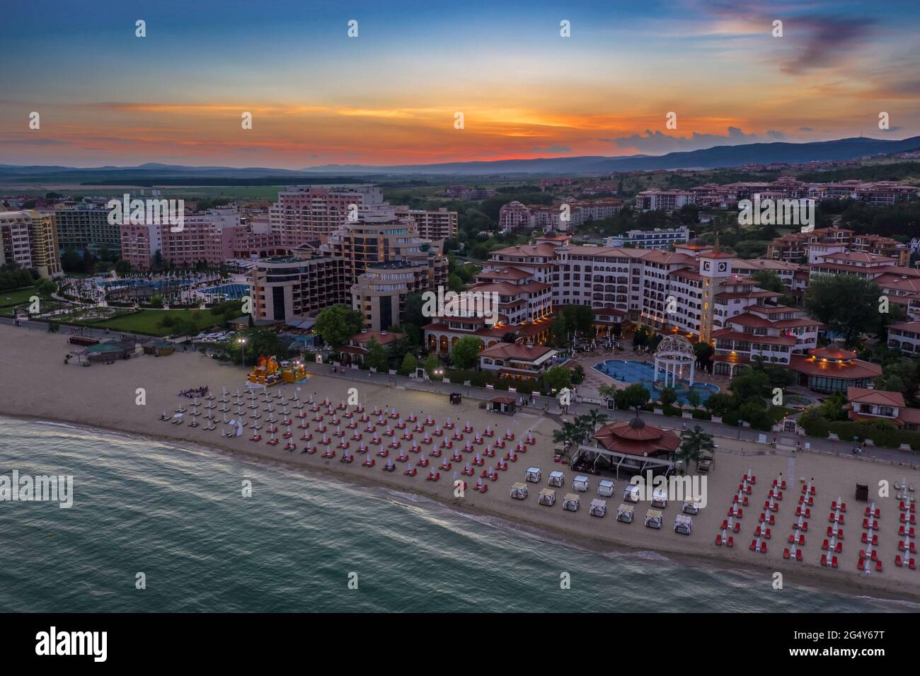 Aerial view to a sea resort Sunny Beach at sunset Stock Photo