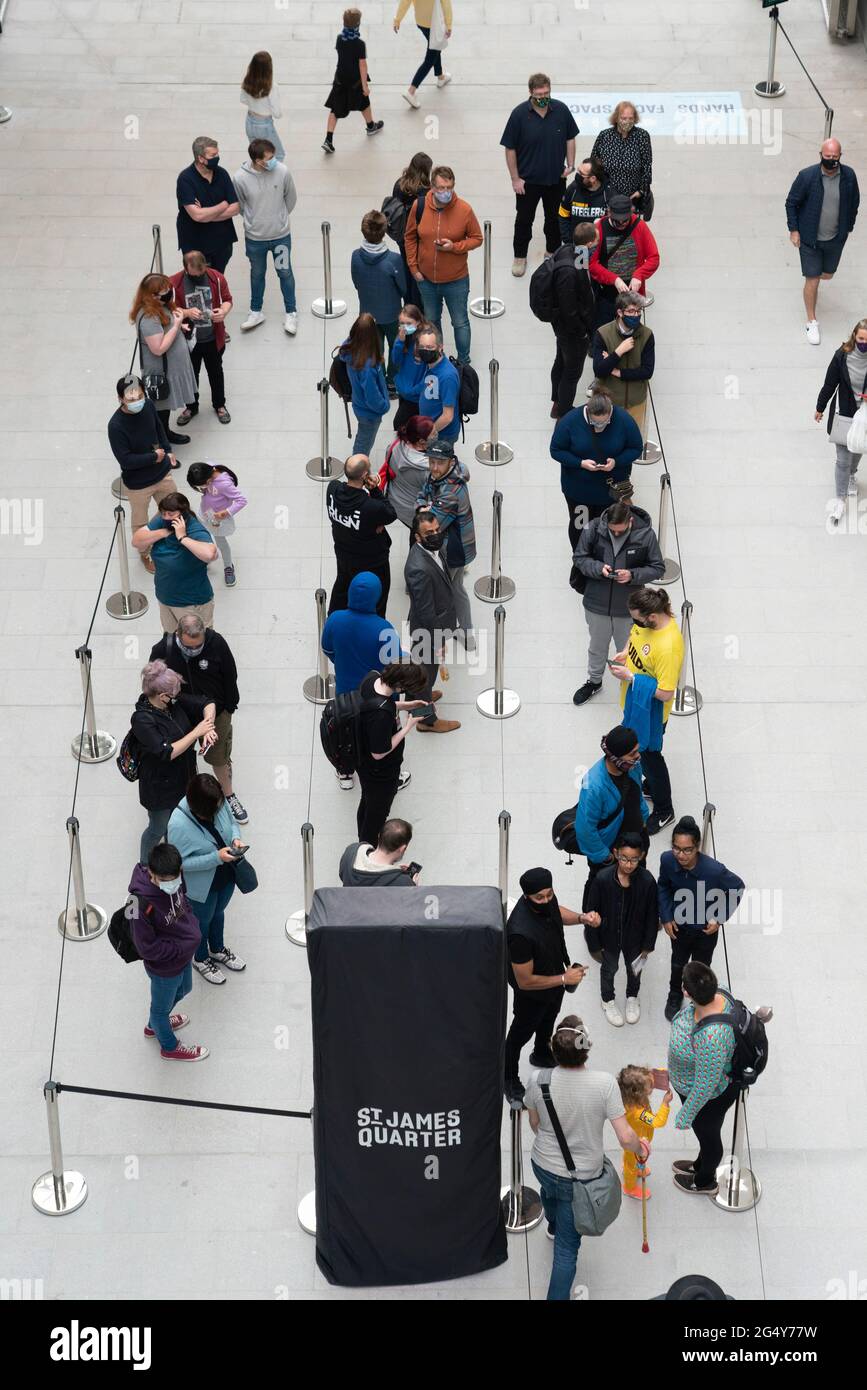 Edinburgh, Scotland, UK. 24 June 2021. First images of the new St James Quarter which opened this morning in Edinburgh. The large retail and residential complex replaced the St James Centre which occupied the site for many years. Pic; Large queues formed outside Lego store.  Iain Masterton/Alamy Live News Stock Photo