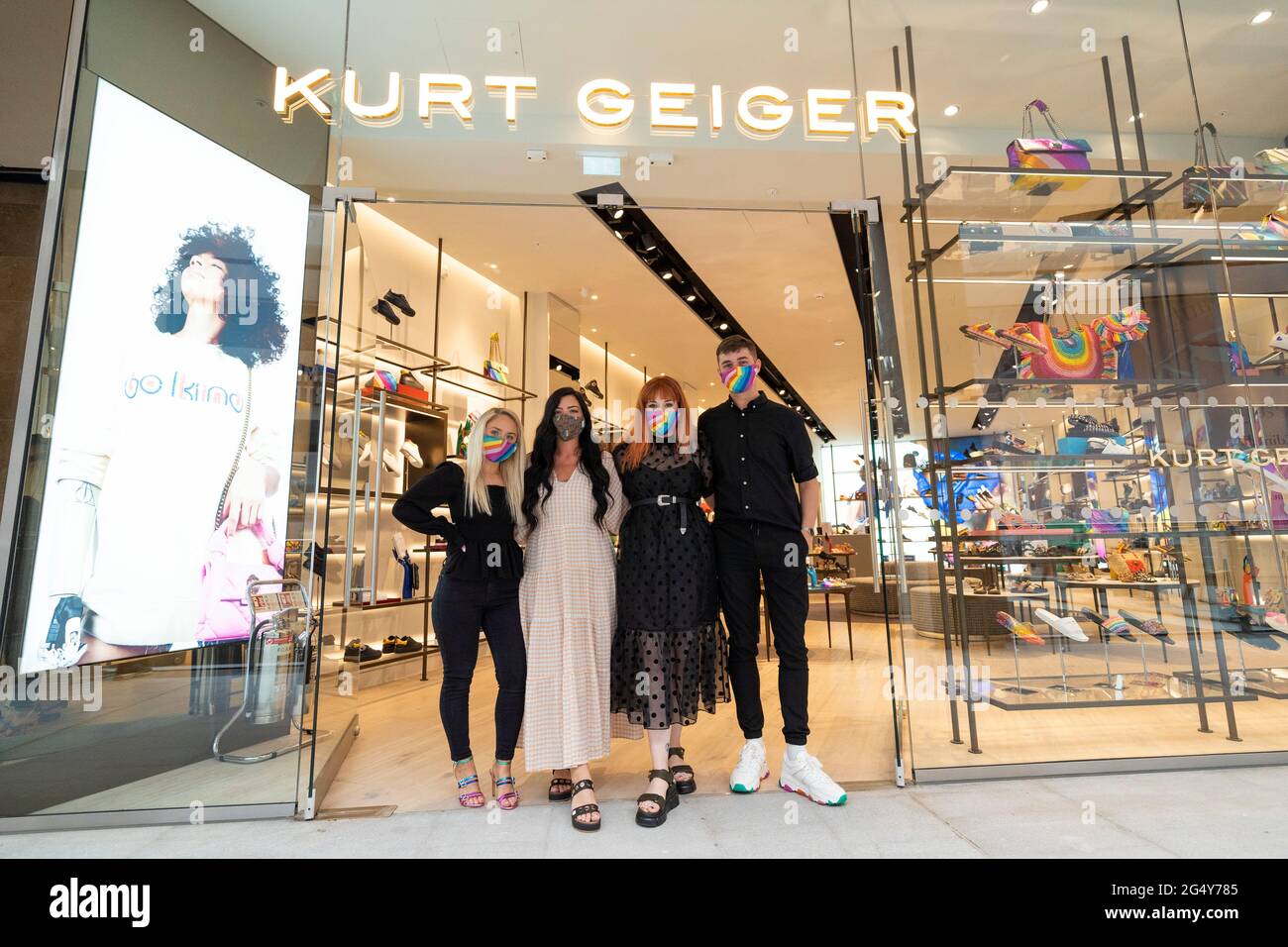 Edinburgh, Scotland, UK. 24 June 2021. First images of the new St James Quarter which opened this morning in Edinburgh. The large retail and residential complex replaced the St James Centre. Pic; Staff at Kurt Geiger pose after opening doors for the first time. Iain Masterton/Alamy Live News Stock Photo