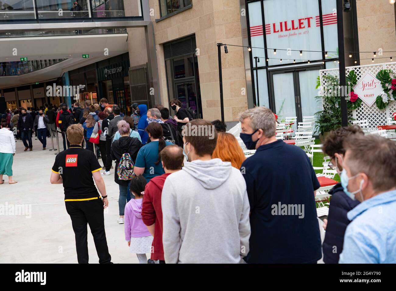 Edinburgh, Scotland, UK. 24 June 2021. First images of the new St James Quarter which opened this morning in Edinburgh. The large retail and residential complex replaced the St James Centre which occupied the site for many years. Pic; Queues formed early outside the Lego store. Iain Masterton/Alamy Live News Stock Photo