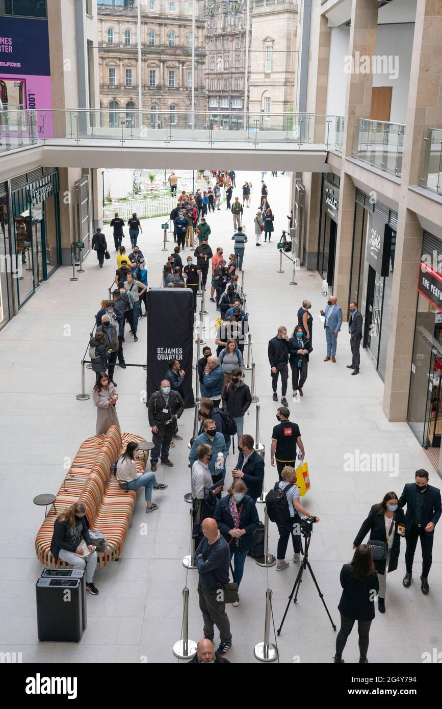 Edinburgh, Scotland, UK. 24 June 2021. First images of the new St James Quarter which opened this morning in Edinburgh. The large retail and residential complex replaced the St James Centre which occupied the site for many years. Pic; Queues formed early outside the Lego store. Iain Masterton/Alamy Live News Stock Photo