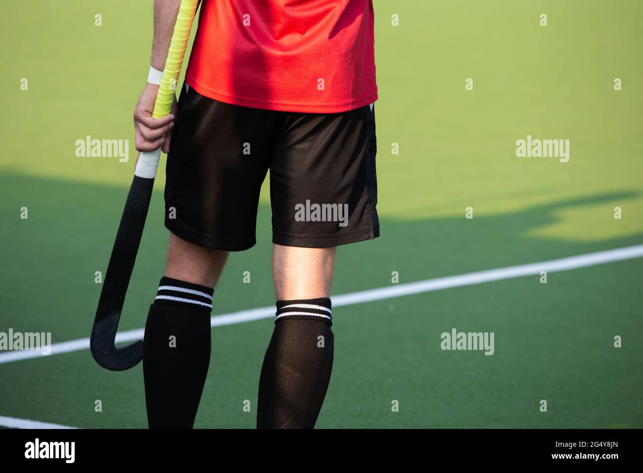 Field hockey player on artificial grass play field Stock Photo Alamy