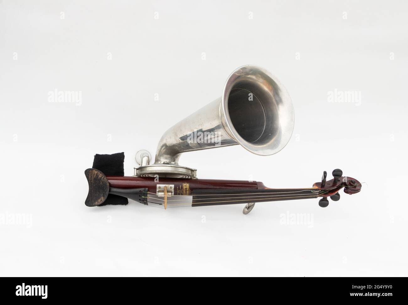 A Stroh violin or phonofiddle or musical recording instrument on a white studio background Stock - Alamy