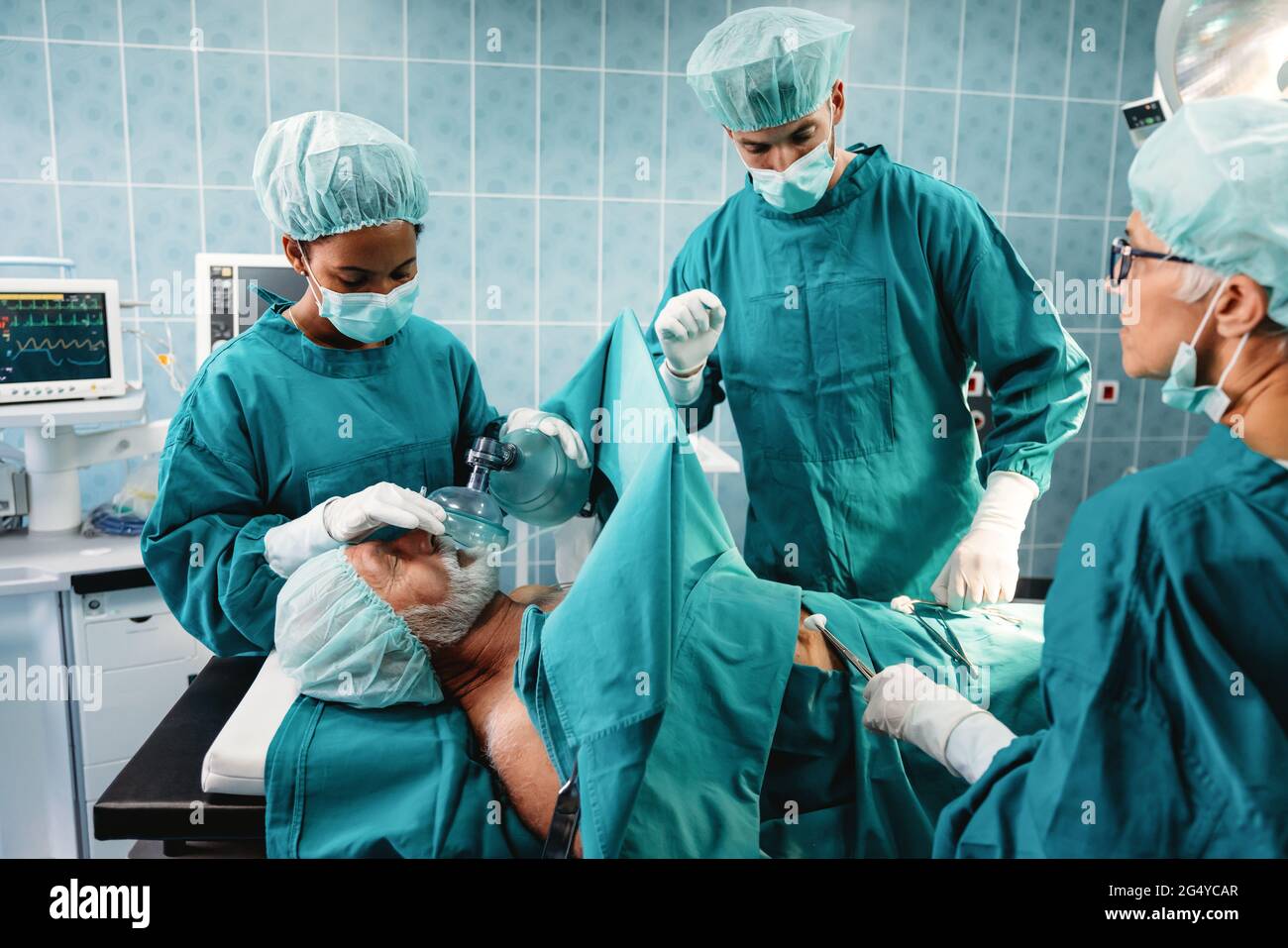 Group of surgeon team at work in operating room in hospital Stock Photo ...