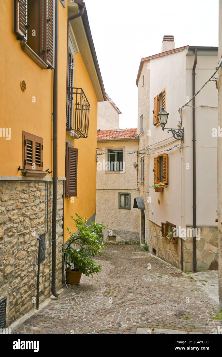 Agnone, Italy, 06/21/2021. A small street between the old houses of a  medieval village in the mountains of Molise region in Italy Stock Photo -  Alamy