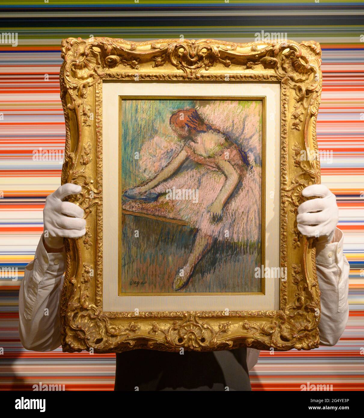 Christie’s, London, UK. 24 June 2021. Works by Basquiat, Degas, Giacometti, Kusama, Picasso and Bridget Riley feature in the 20th century art sale, to be held on 30 June in London. Image: Danseuse rose by Edgar Degas, pastel on paper circa 1896, estimate £2,500,000-3,500,000 in front of Strip by Gerhard Richter, estimate: £800,000-1,200,000. Credit: Malcolm Park/Alamy Live News. Stock Photo