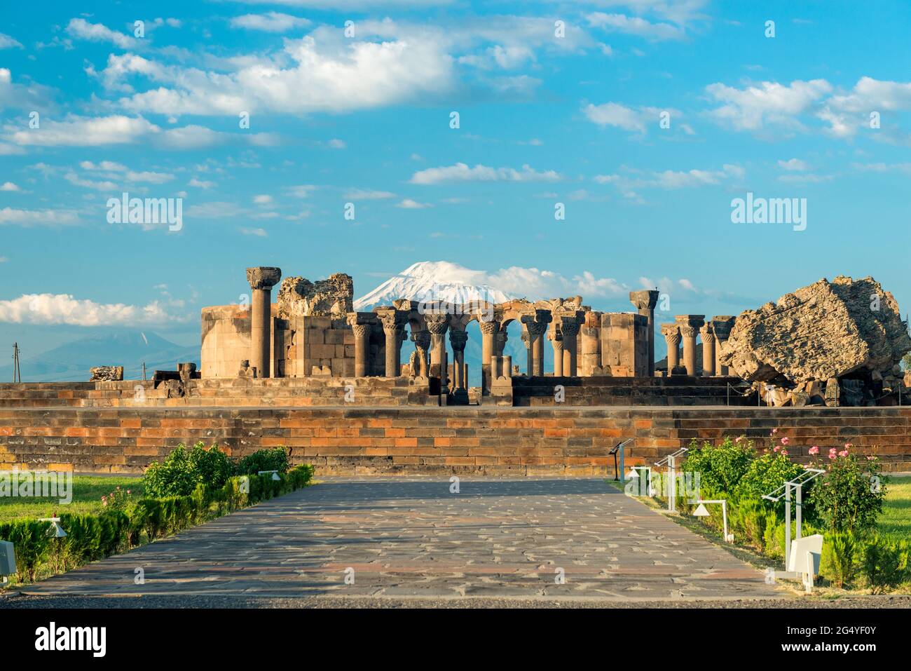 Zvartnots temple, ruins on a sunny day on the background of Mount Ararat - a tourist attraction of Armenia Stock Photo