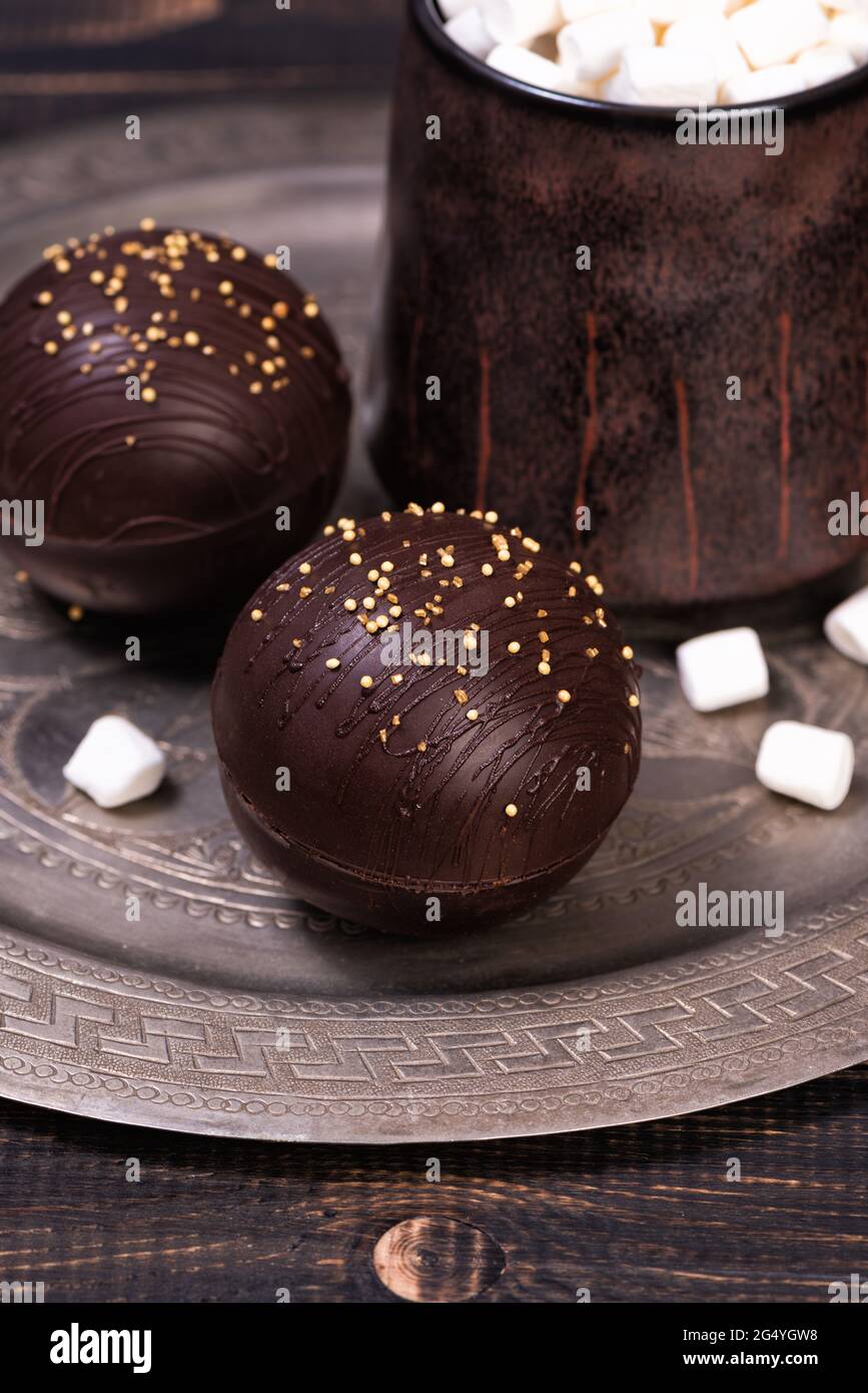 Chocolate ball bomb with marshmallows and milk. Cup of hot sweet cocoa drink Stock Photo Alamy
