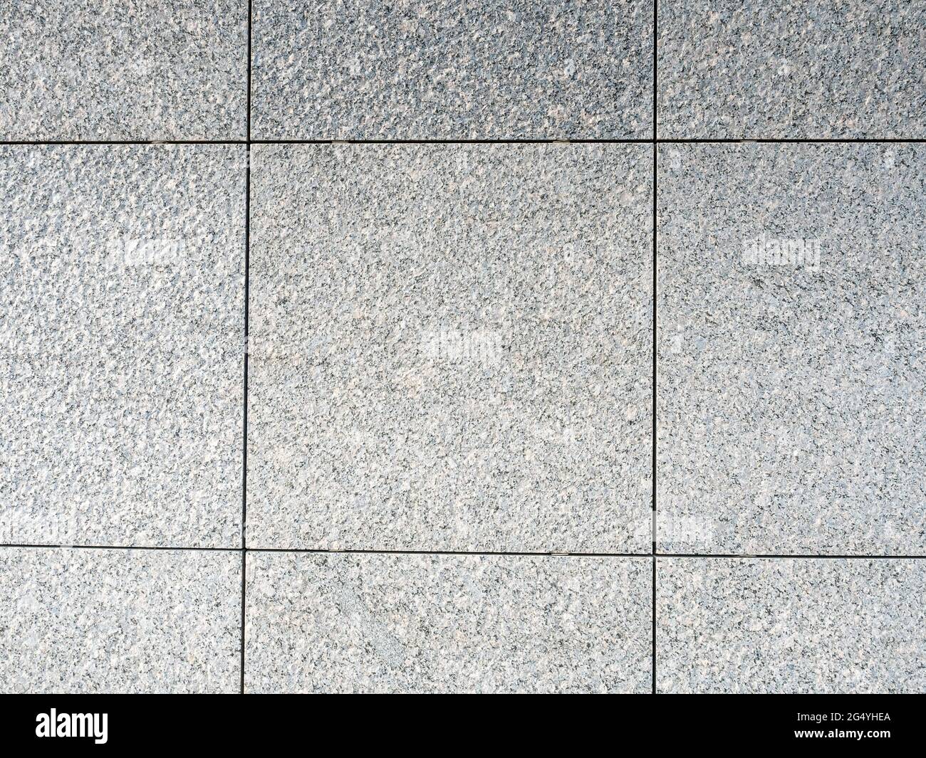 Gray stone brick wall tile for background Stock Photo - Alamy