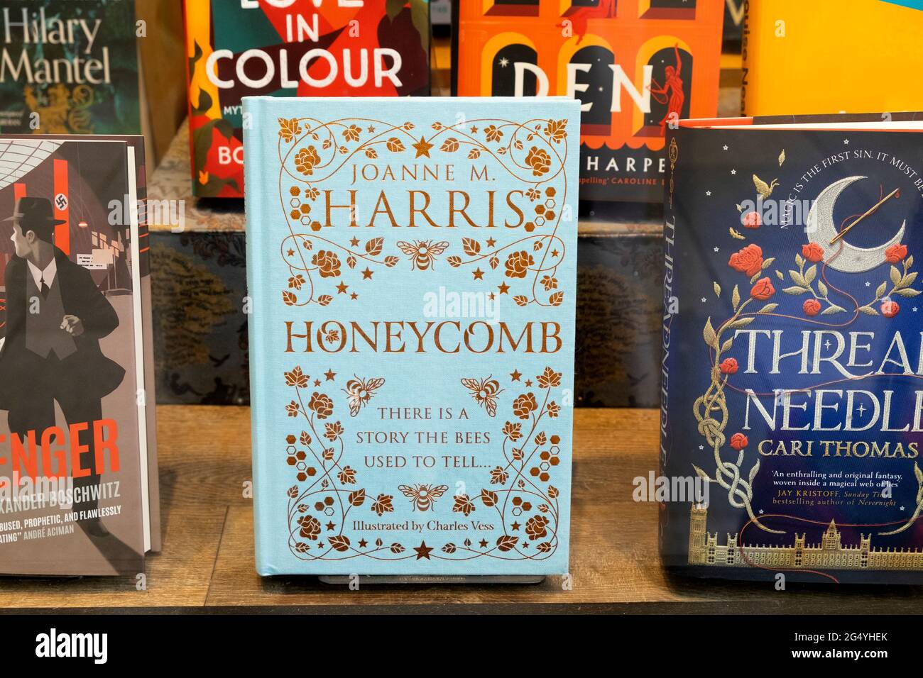 British author Joanne Harris Honeycomb front cover Waterstones book shop window display books in summer June 2021 London England UK KATHY DEWITT Stock Photo