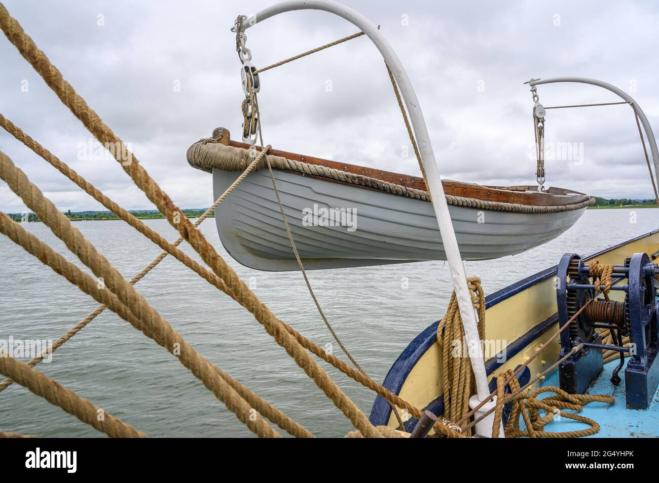Ropes and dinghy on "Edith May" historic sailing barge during a charter