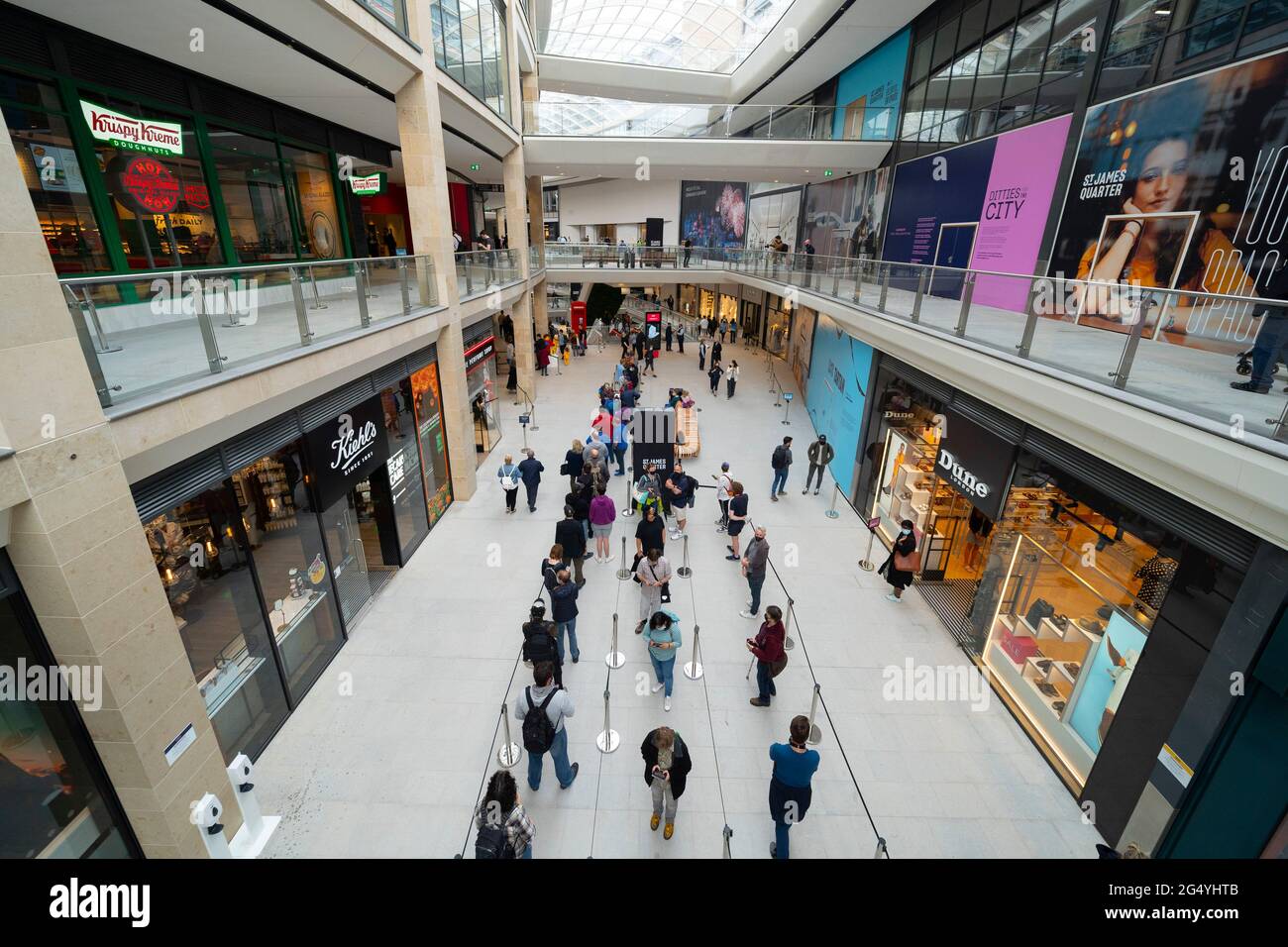 Edinburgh, Scotland, UK. 24 June 2021. First images of the new St James Quarter which opened this morning in Edinburgh. The large retail and residential complex replaced the St James Centre which occupied the site for many years. Pic; Queues outside Lego store in mall. Iain Masterton/Alamy Live News Stock Photo