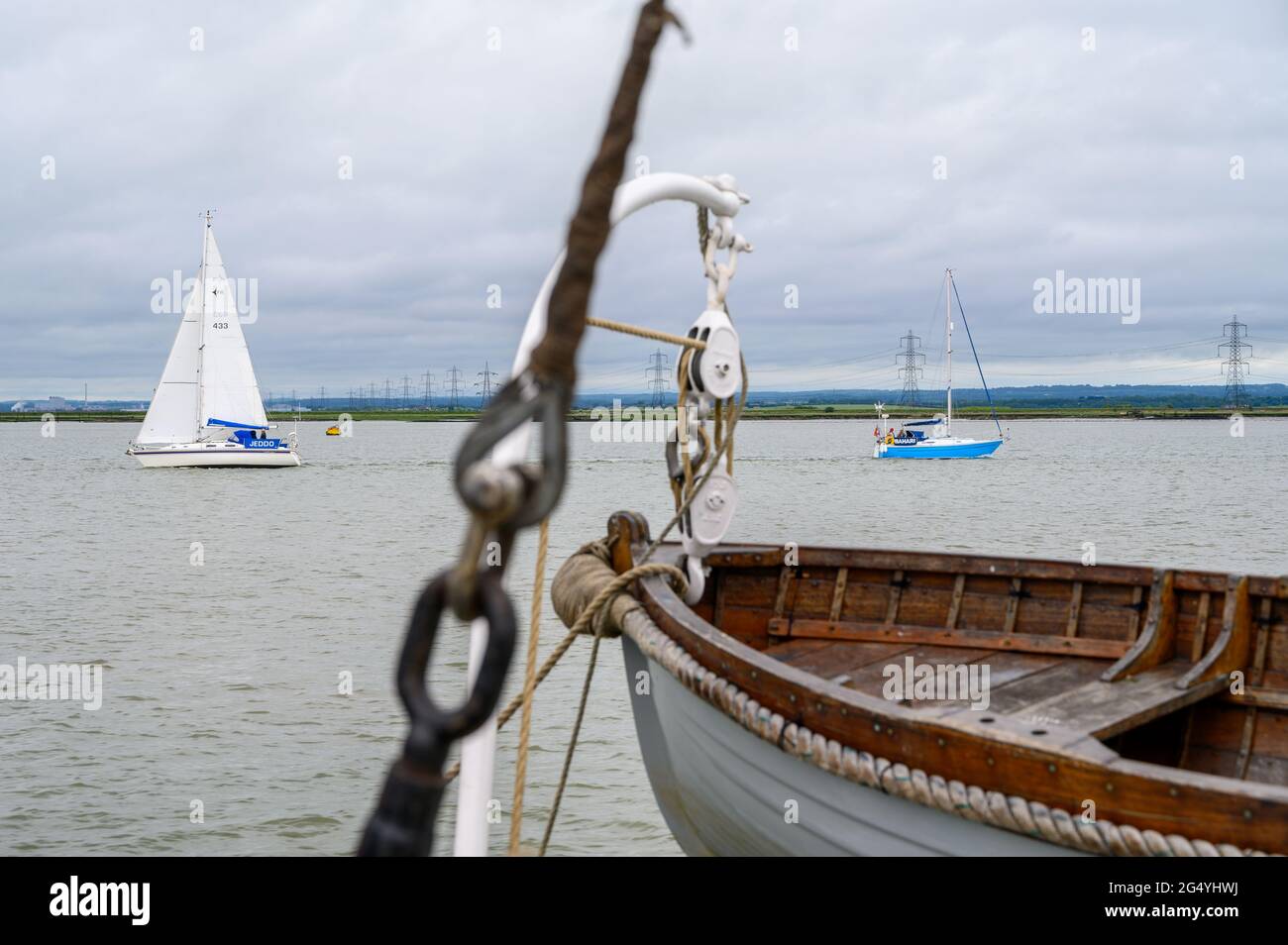 Two sail boats on Thames estuary seen from "Edith May" historic sailing