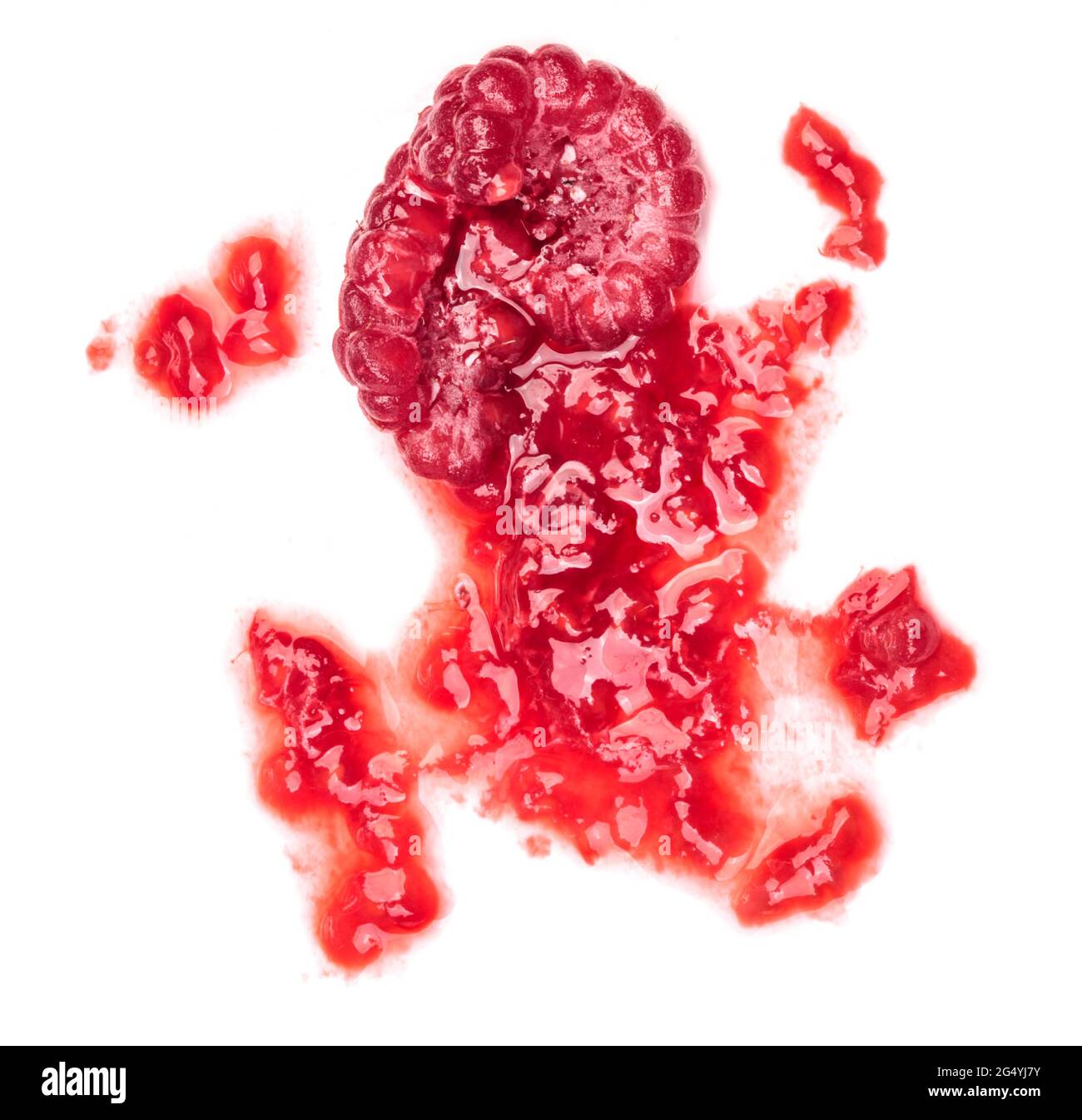 Smashed raspberries isolated on white Stock Photo - Alamy