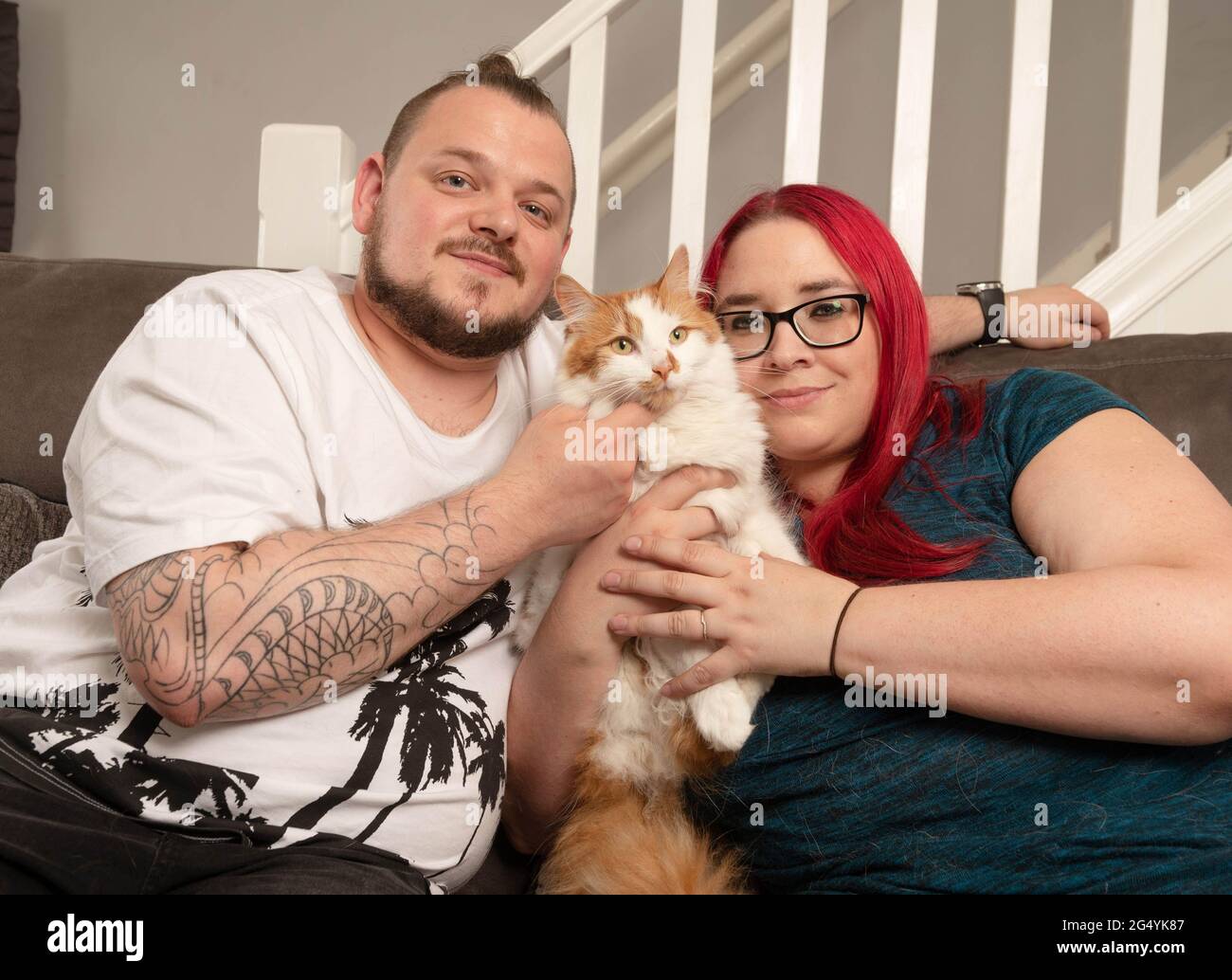 EDITORIAL USE ONLY Caroline and Damon Green from Leeds with their pet cat  Bruno, who has been nominated in the 'Purina Better Together' category in  this year's Cats Protection National Cat Awards,