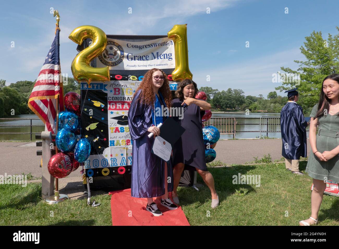 With graduations severely curtailed by covid, Congresswoman Grace Meng invited students to an outdoor celebration. In a park in Queens, New York. Stock Photo