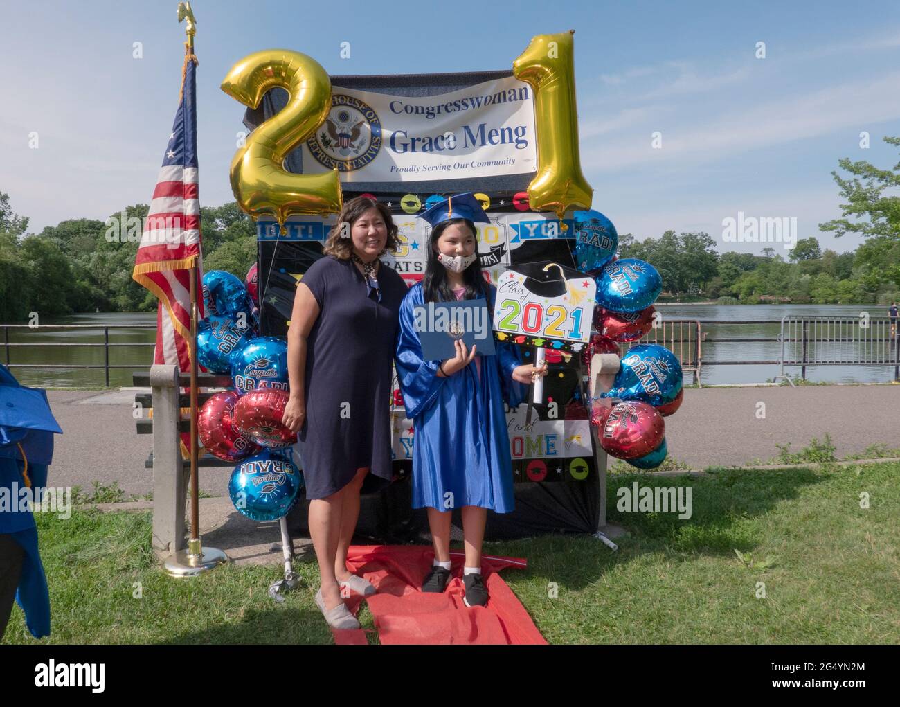 With graduations severely curtailed by covid, Congresswoman Grace Meng invited students to an outdoor celebration. In a park in Queens, New York. Stock Photo