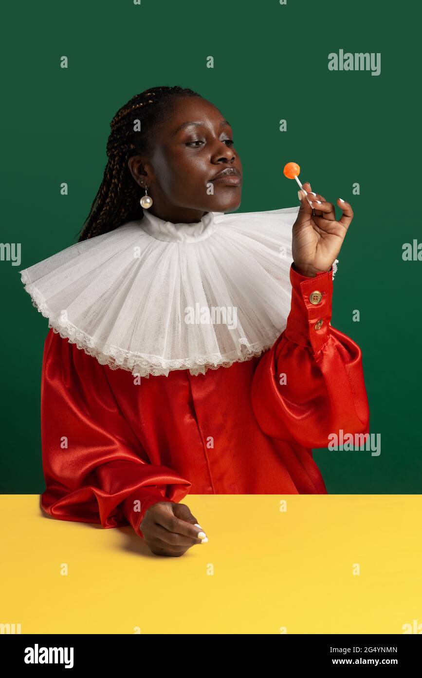 One African young woman in bright red 