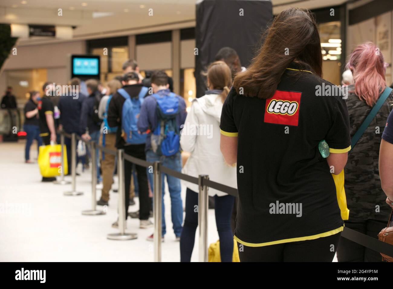 Edinburgh, UK, 24th June, 2021: Shoppers queued to visit the Lego store at  the opening of the first phase of the £1 billion St James Quarter retail  destination in Edinburgh. Pic: TERRY