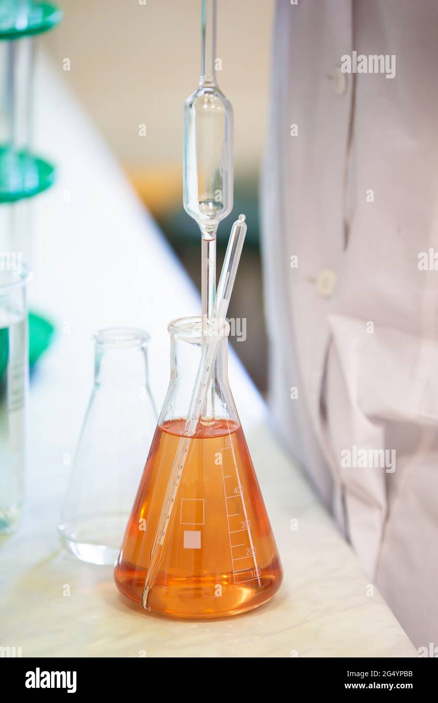 Laboratory with glass test tubes for alcoholic beverages Stock Photo